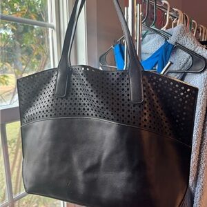 Black Perforated Tote Bag. Gold interior